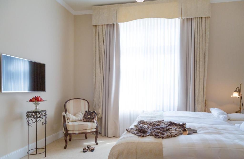 Postel nebo postele na pokoji v ubytování Hotel Miramar
