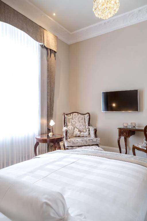 Postel nebo postele na pokoji v ubytování Hotel Miramar