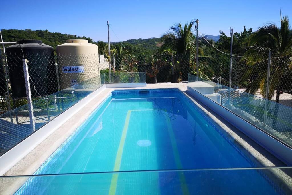 Bazén v ubytování C4 casa segundo nivel peñita con alberca privada nebo v jeho okolí