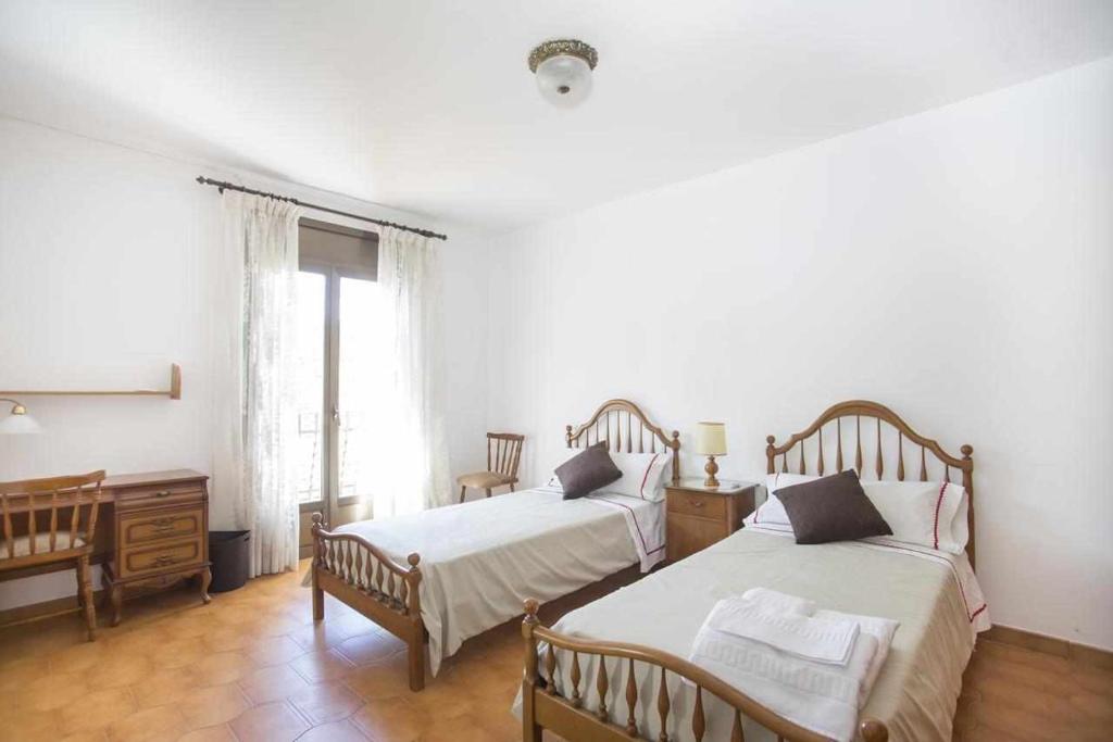 Postel nebo postele na pokoji v ubytování Casa Ca l'Ester Terra alta Matarraña