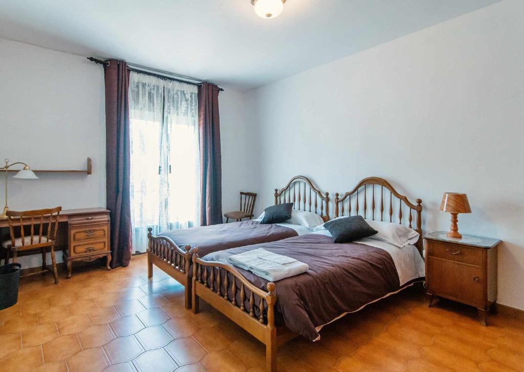 Postel nebo postele na pokoji v ubytování Casa Ca l'Ester Terra alta Matarraña