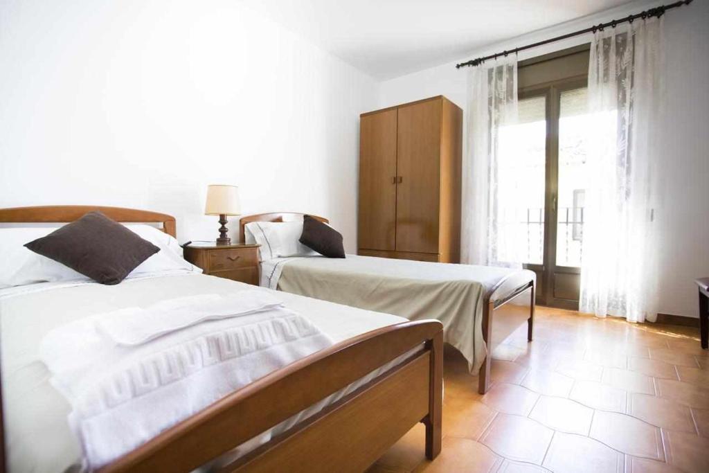 Postel nebo postele na pokoji v ubytování Casa Ca l'Ester Terra alta Matarraña