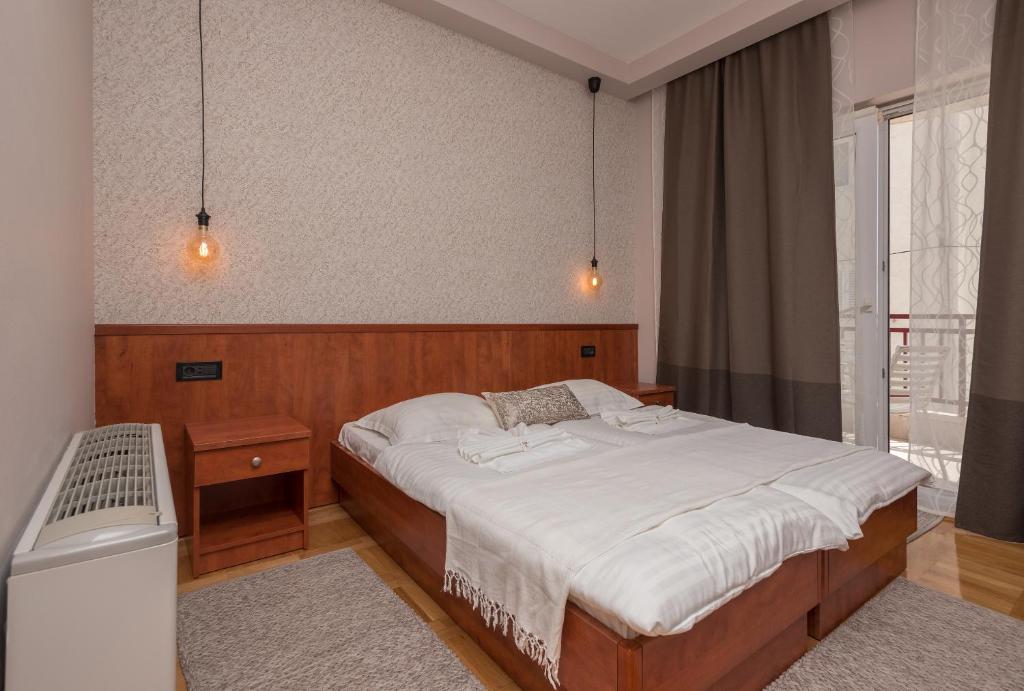 Postel nebo postele na pokoji v ubytování Villa Vinka