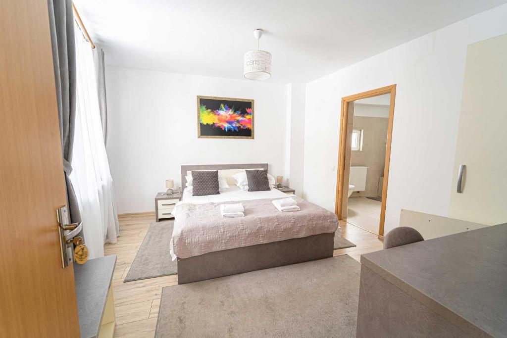 Postel nebo postele na pokoji v ubytování Casa Bucegi Busteni