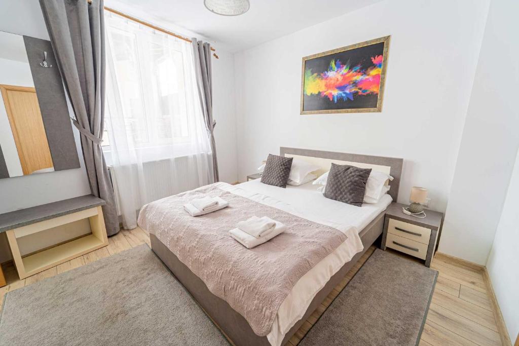 Postel nebo postele na pokoji v ubytování Casa Bucegi Busteni