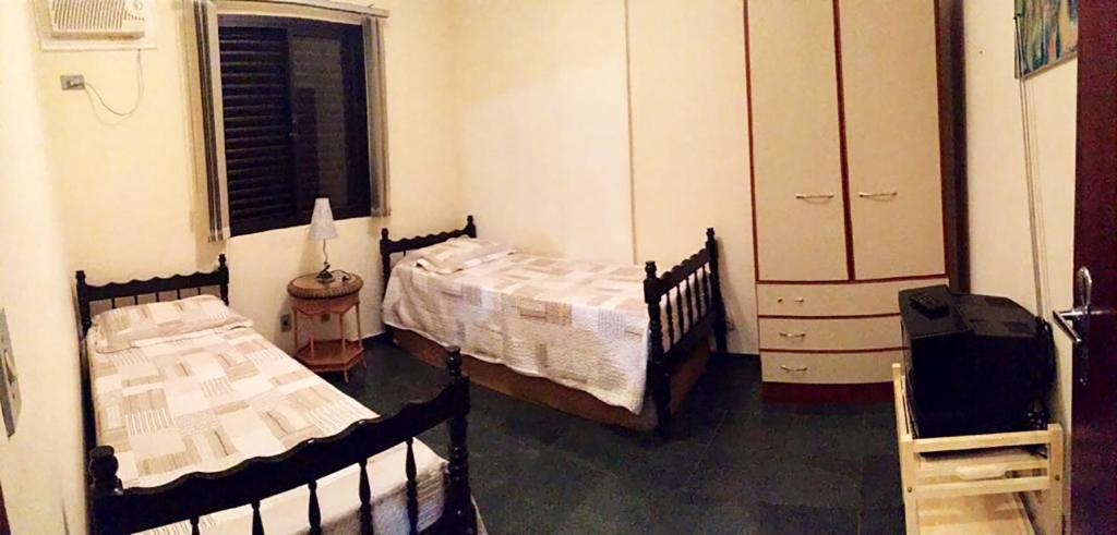  Apartamento com piscina e churrasqueira em Ubatuba