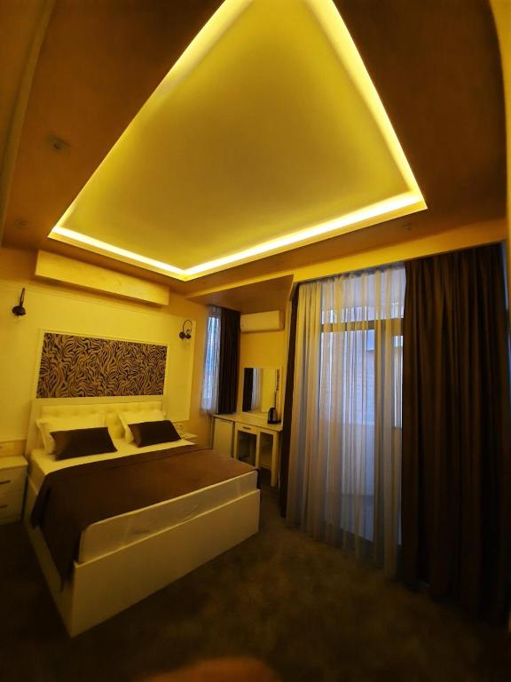 Postel nebo postele na pokoji v ubytování Hotel Juliet Yerevan