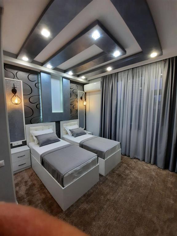 Postel nebo postele na pokoji v ubytování Hotel Juliet Yerevan
