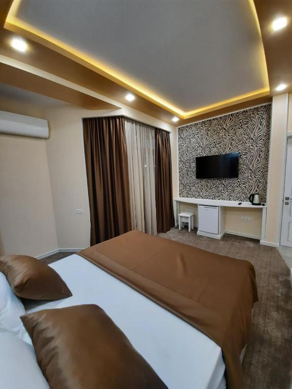 Postel nebo postele na pokoji v ubytování Hotel Juliet Yerevan