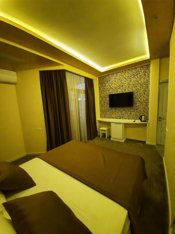 Postel nebo postele na pokoji v ubytování Hotel Juliet Yerevan