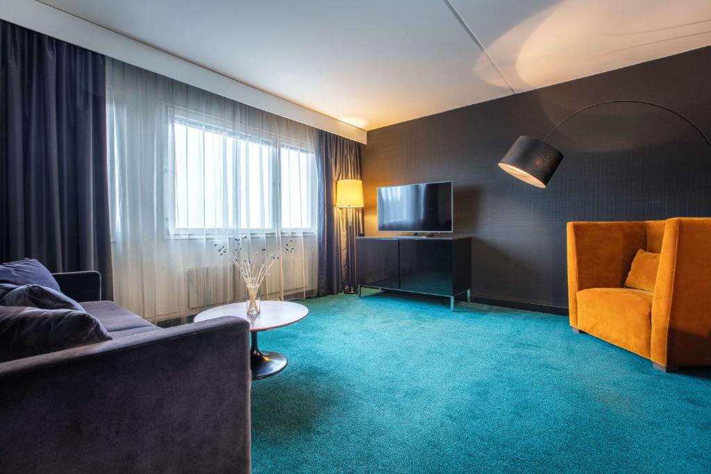 TV a/nebo společenská místnost v ubytování Radisson Blu Hotel Malmö