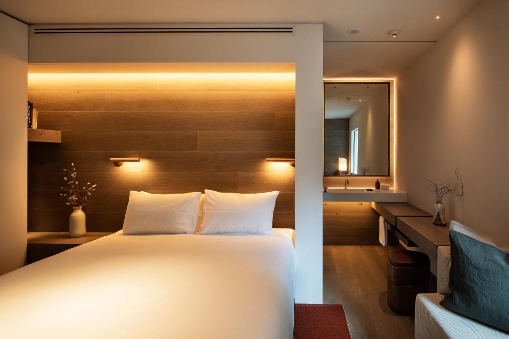 Postel nebo postele na pokoji v ubytování The Hotel Britomart