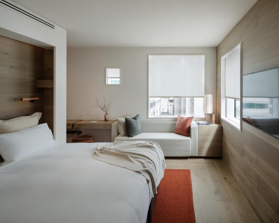 Postel nebo postele na pokoji v ubytování The Hotel Britomart