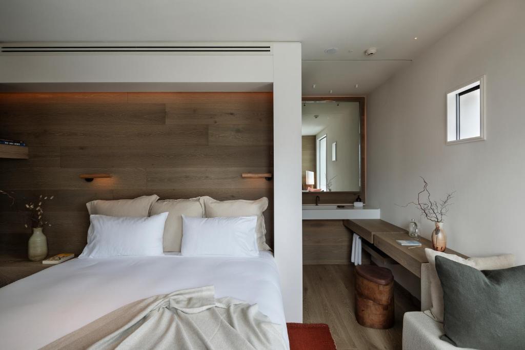 Postel nebo postele na pokoji v ubytování The Hotel Britomart