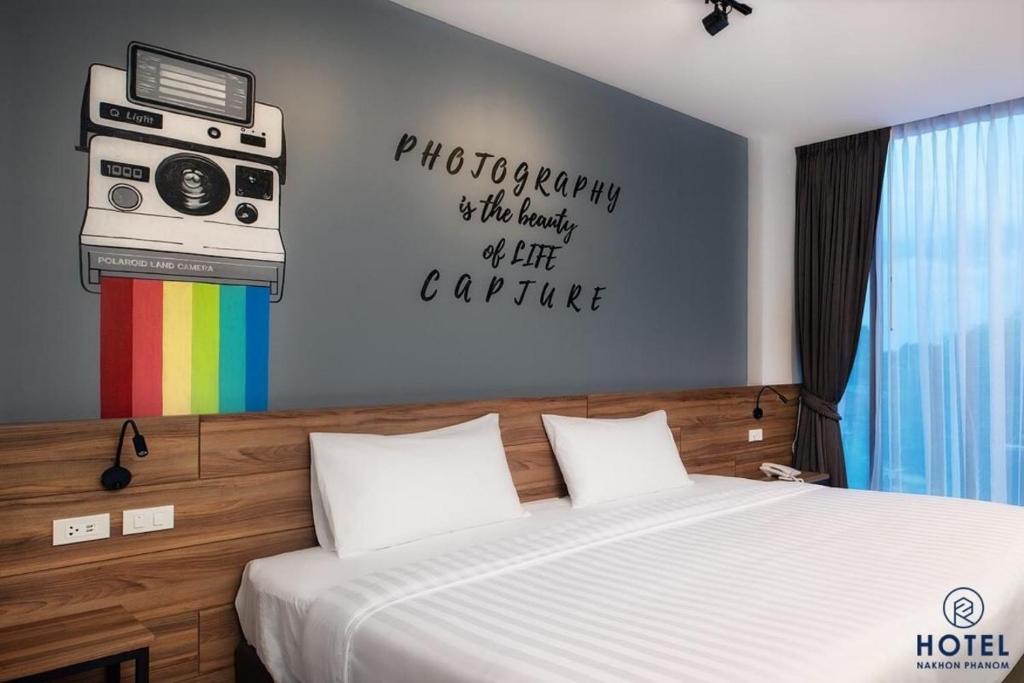 Postel nebo postele na pokoji v ubytování R2 Hotel