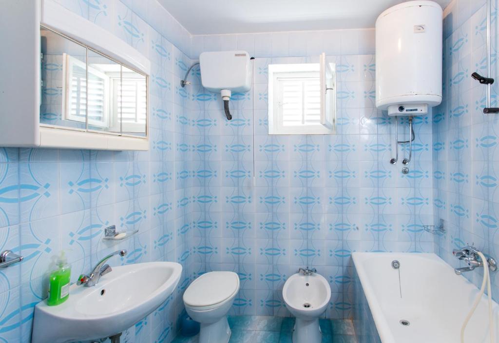 Ванная комната в Guest House Raguž