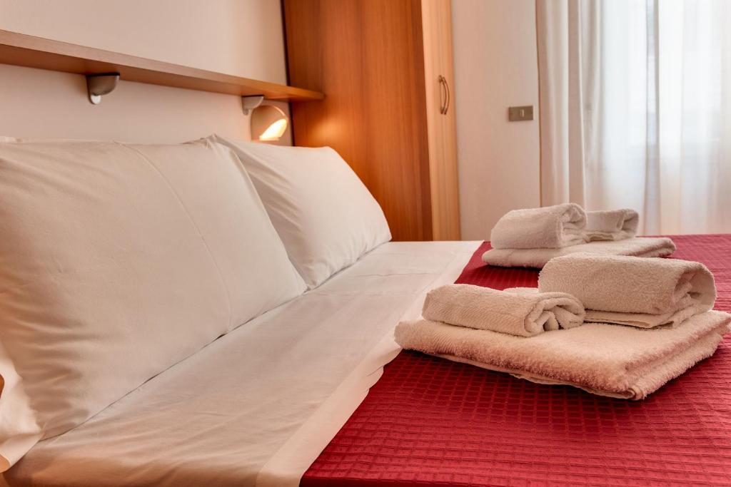 Postel nebo postele na pokoji v ubytování Casa Portofino Rooms&Breakfast