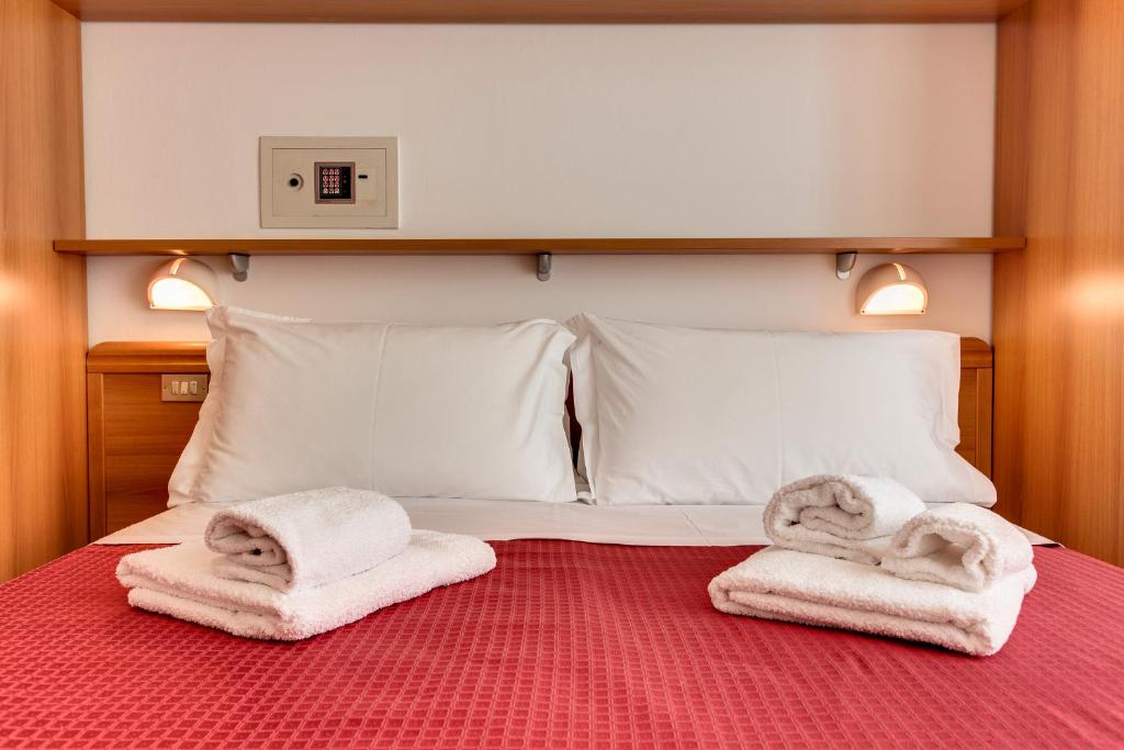 Postel nebo postele na pokoji v ubytování Casa Portofino Rooms&Breakfast