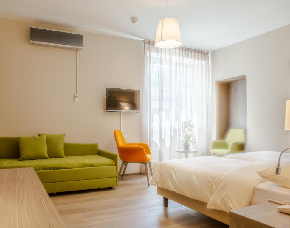 Postel nebo postele na pokoji v ubytování Hotel Unione