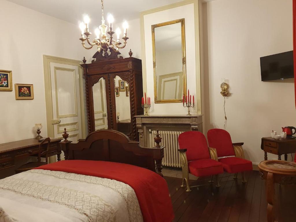 Кровать или кровати в номере B & B Les Secrets des Loges