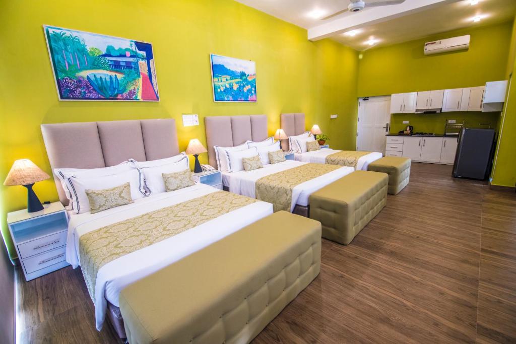 Postel nebo postele na pokoji v ubytování Tip Top Boutique hotel