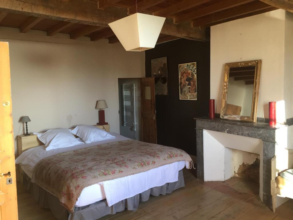 Postel nebo postele na pokoji v ubytování La Maison de Louis