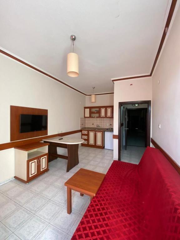 TV a/nebo společenská místnost v ubytování Lavinia Apart & Hotel