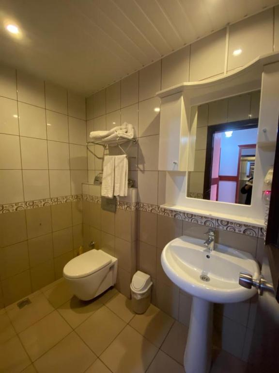 Koupelna v ubytování Lavinia Apart & Hotel