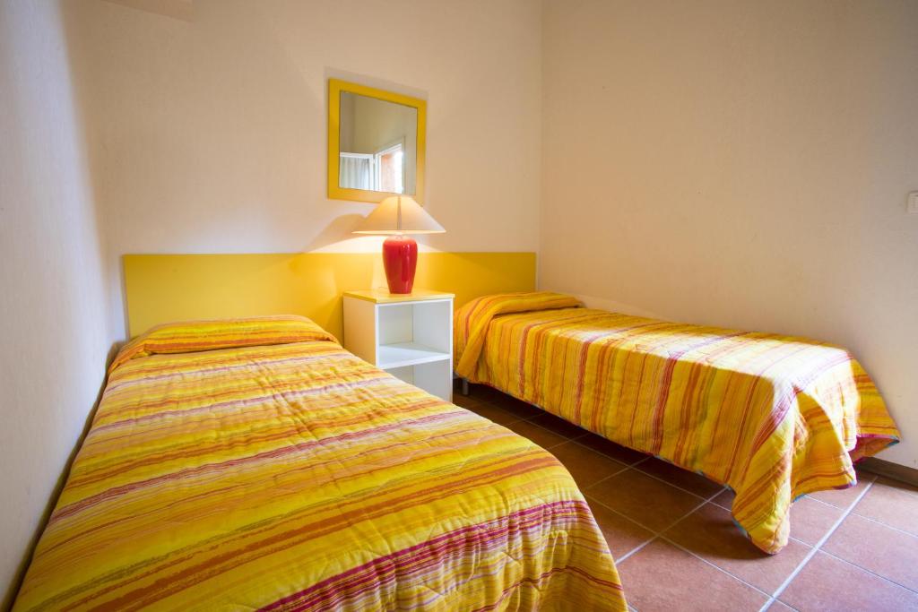 Voodi v&otilde;i voodid majutusasutuse Residence de Tourisme Marina Corsa toas
