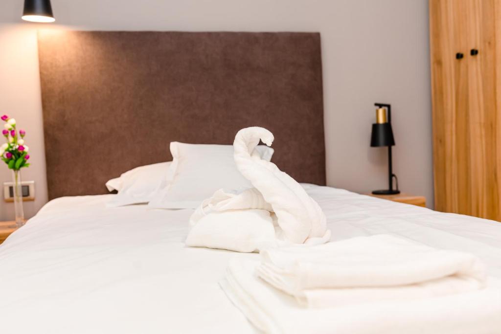 Postel nebo postele na pokoji v ubytování Labirint Boutique Hotel