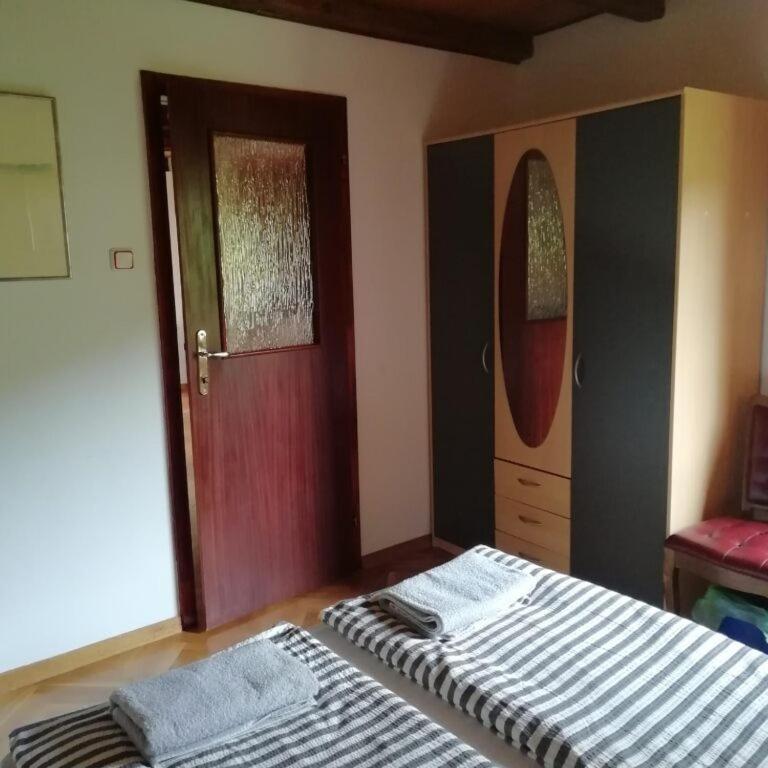 Postel nebo postele na pokoji v ubytování Holiday Home Jakovci