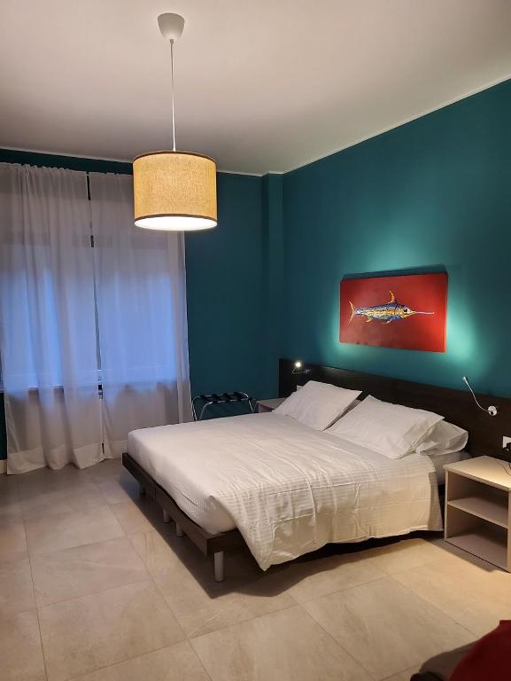 A bed or beds in a room at Casa Consani