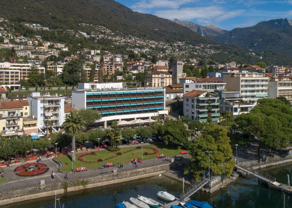 
a city with a lot of tall buildings at Hotel Lago Maggiore in Locarno
