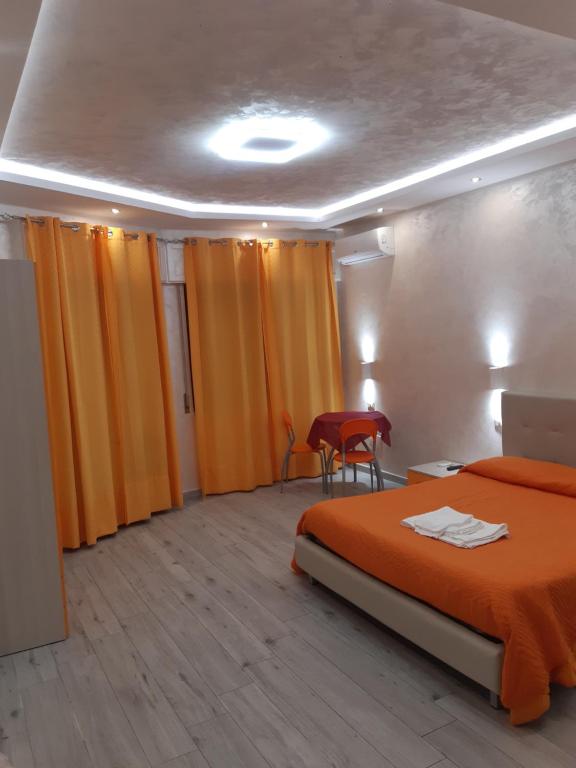 Posteľ alebo postele v izbe v ubytovaní B&B La Colonna