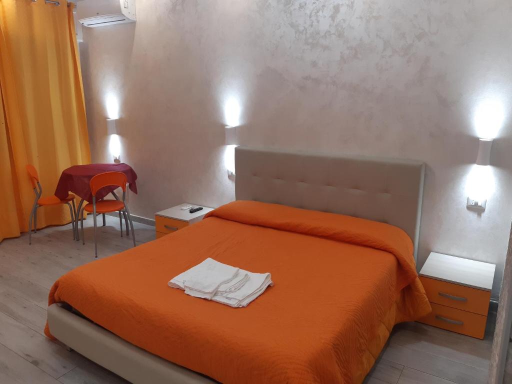 Posteľ alebo postele v izbe v ubytovaní B&B La Colonna