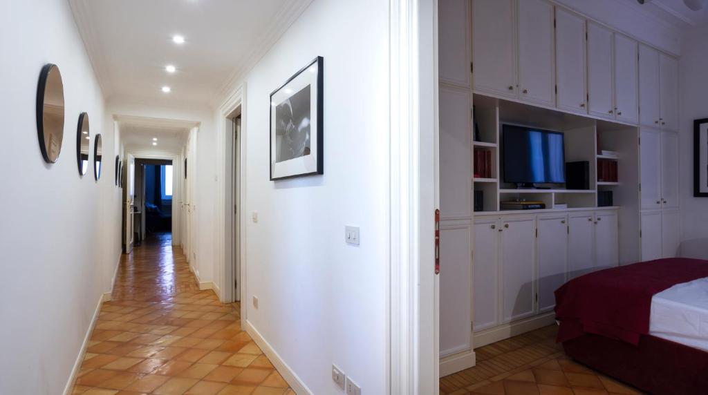 Łóżko lub łóżka w pokoju w obiekcie Luxury Maison Letizia Piazza di Spagna