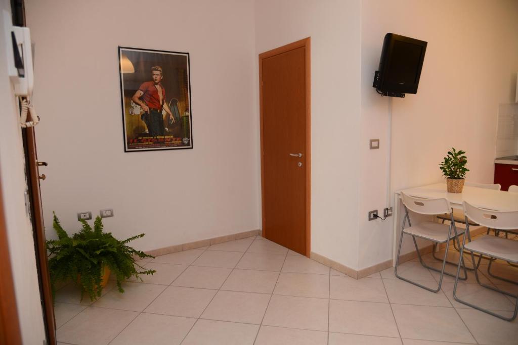TV a/nebo společenská místnost v ubytování Jonico Guest House