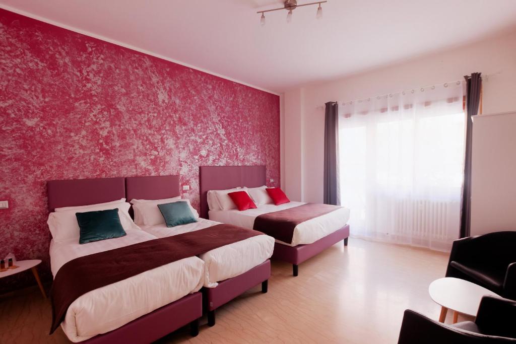 Un pat sau paturi într-o cameră la Apartment Rome Suite Vatican