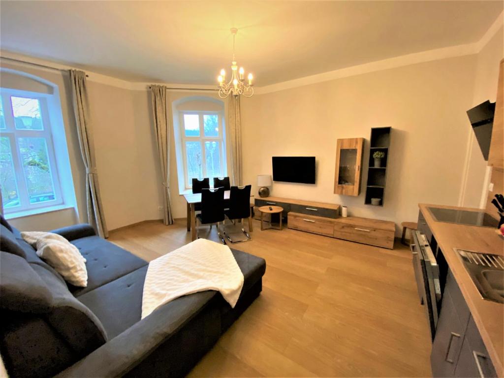 Telewizja i/lub zestaw kina domowego w obiekcie Apartments Magnolia