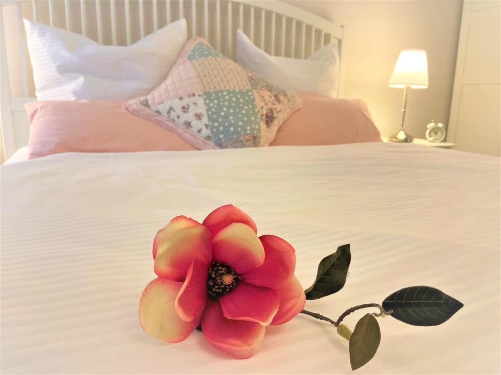 Łóżko lub łóżka w pokoju w obiekcie Apartments Magnolia