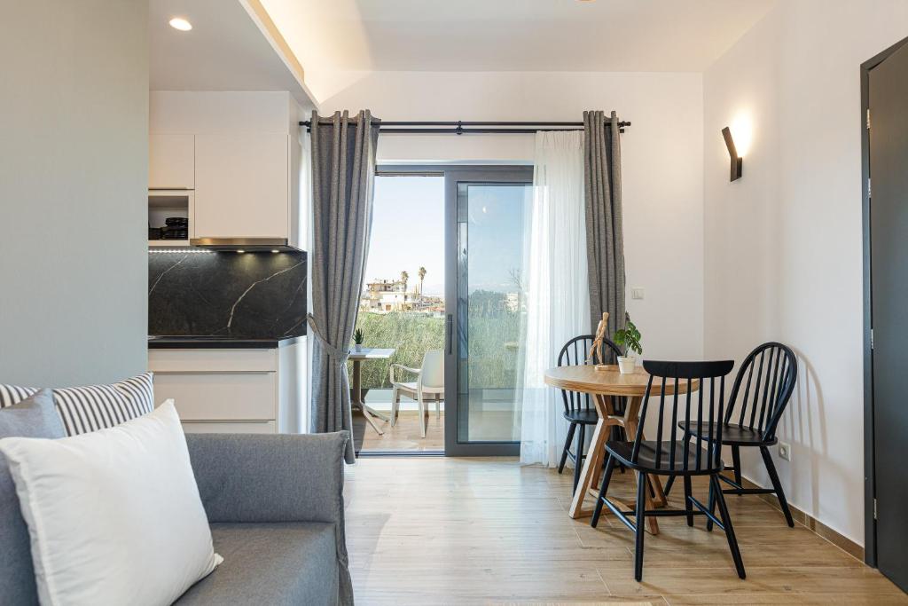Telewizja i/lub zestaw kina domowego w obiekcie Eleven Boutique Suites