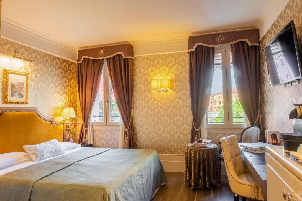TV a/nebo společenská místnost v ubytování Hotel Moresco
