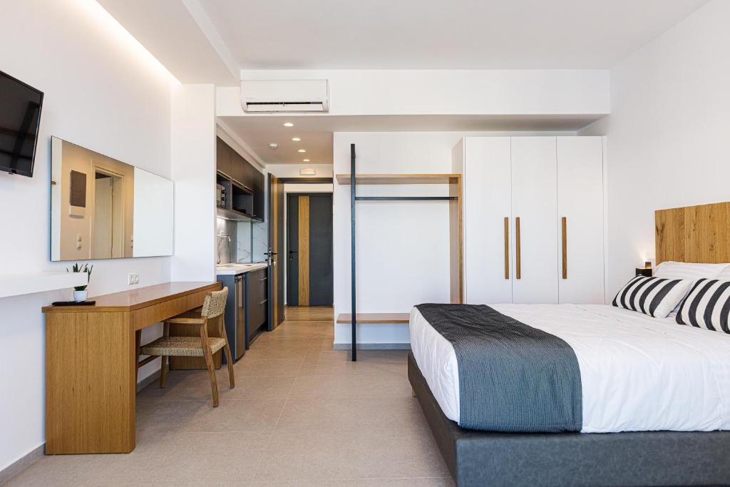 Łóżko lub łóżka w pokoju w obiekcie Eleven Boutique Suites