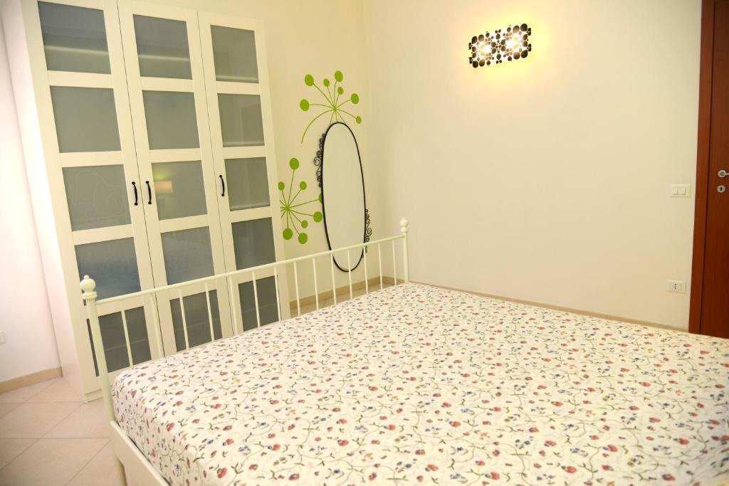 Postel nebo postele na pokoji v ubytování Jonico Guest House