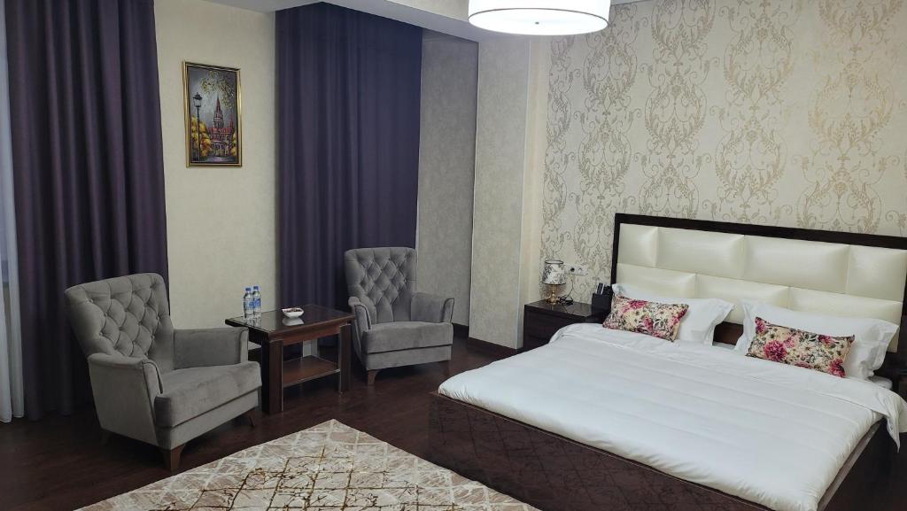 Postel nebo postele na pokoji v ubytování HOTEL AYNI