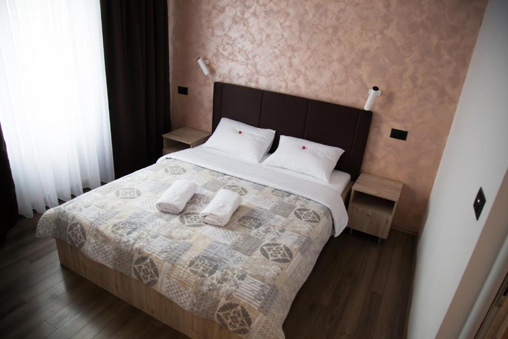 Cama o camas de una habitación en Hotel "Srbija Tis"