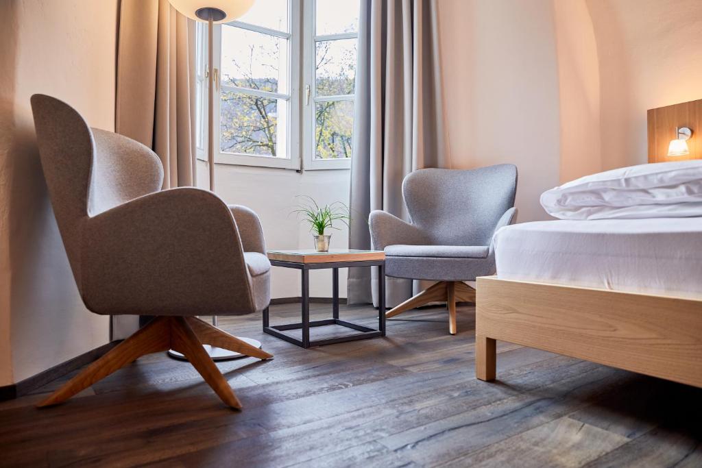 Postel nebo postele na pokoji v ubytování Hotel Walther v.d. Vogelweide Superior