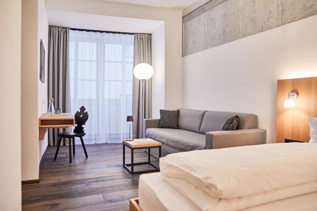 Postel nebo postele na pokoji v ubytování Hotel Walther v.d. Vogelweide Superior