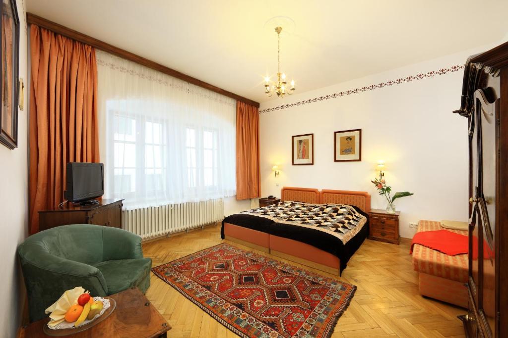 Cama o camas de una habitación en Hotel Konvice