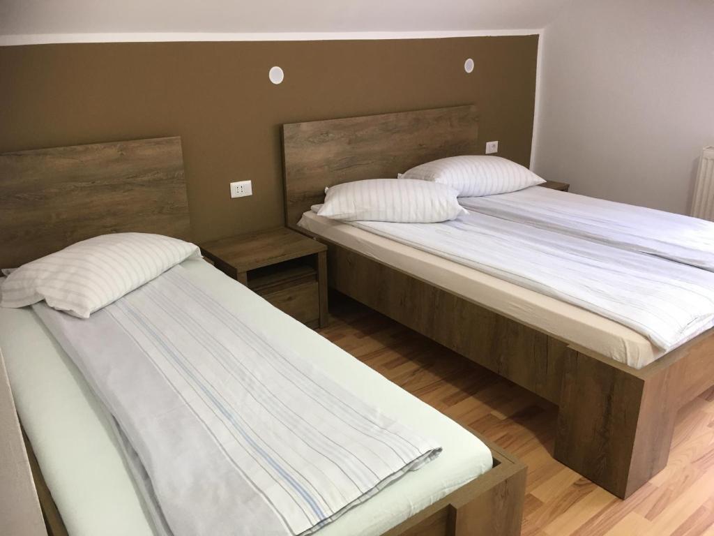 Postel nebo postele na pokoji v ubytování Casa Popa’s